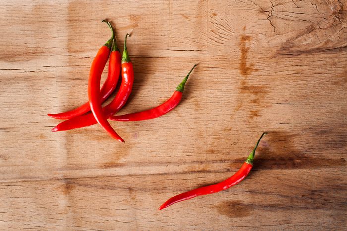 Chilli pepper close up on wood desk